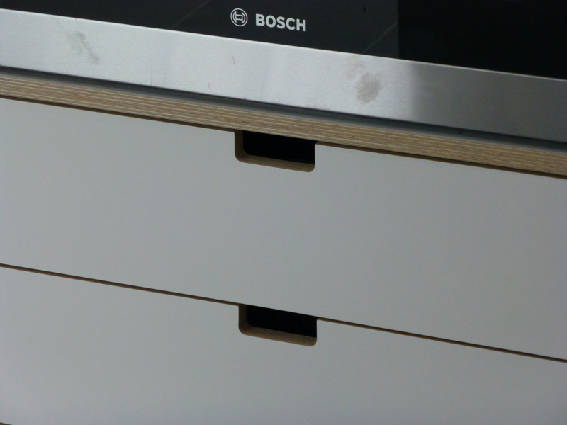 cut-out drawer handles in bespoke kitchen