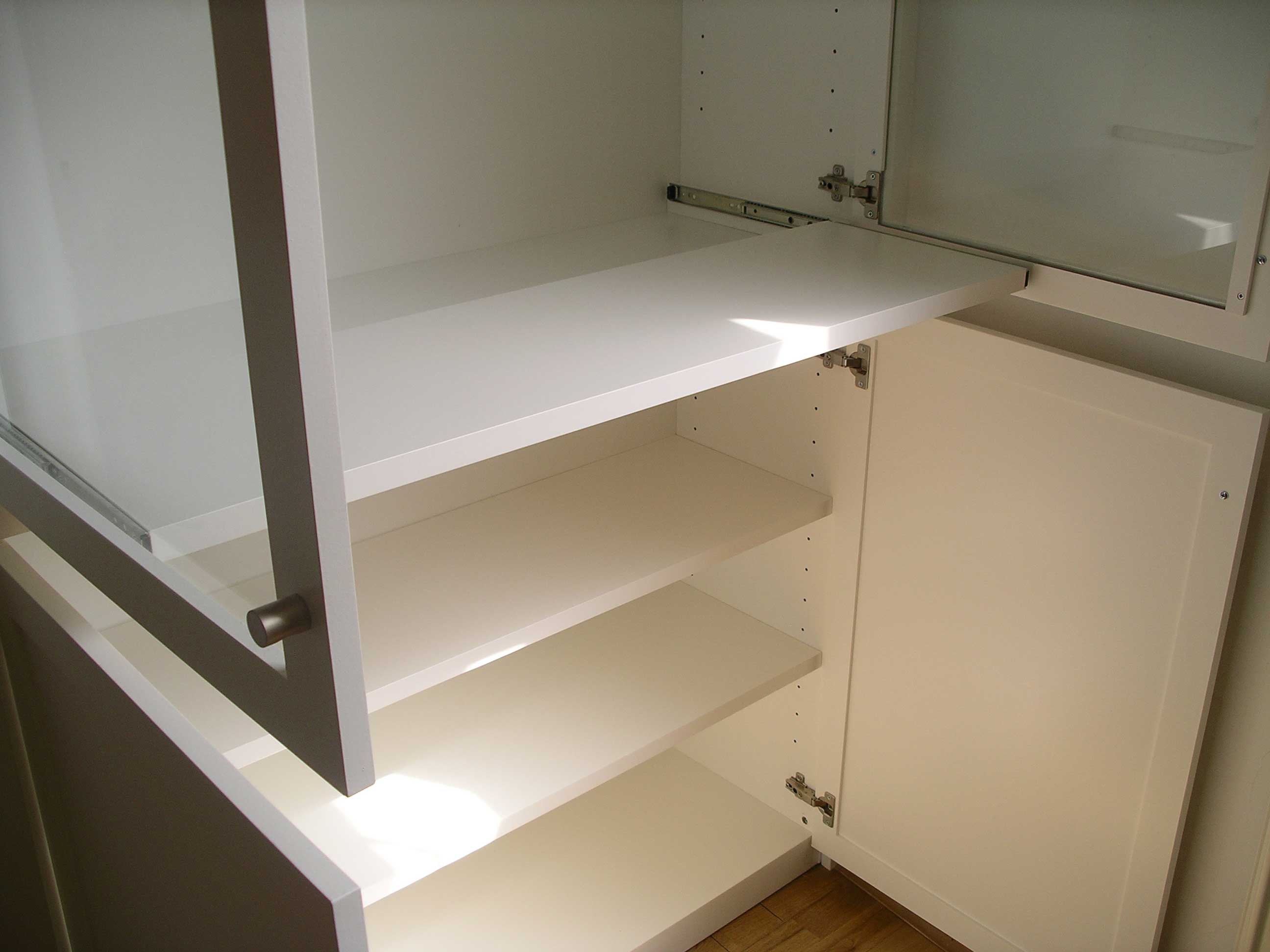pull out shelf in bespoke cabinet