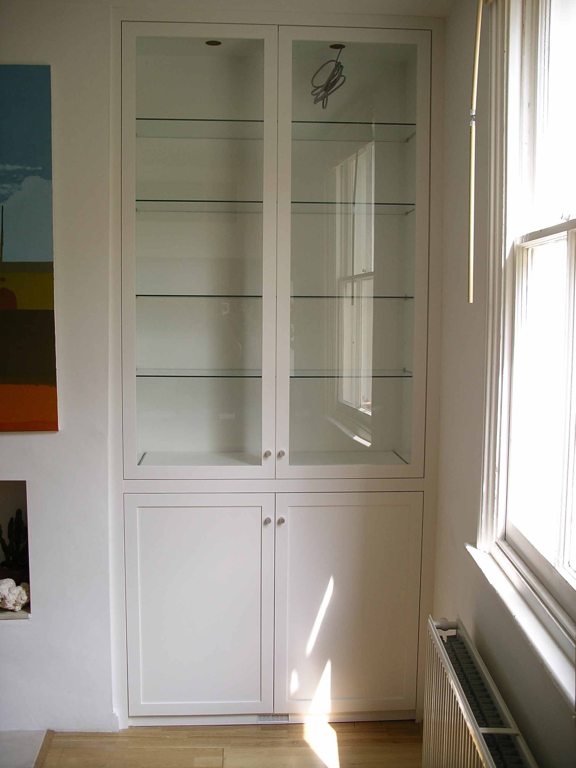 glazed alcove cabinet with glass shelves