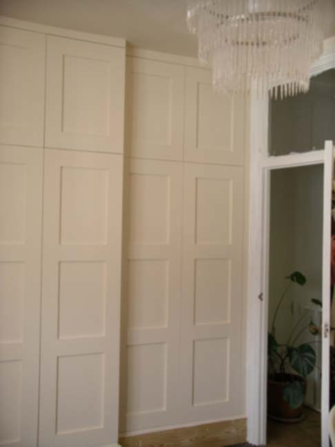 fitted traditional style wardrobe with panelled doors