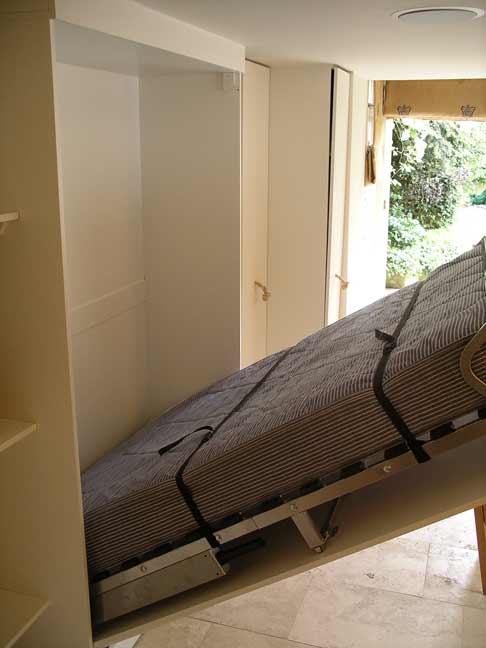 hide-away bed in bespoke cabinet