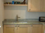 handmade kitchen in solid maple hardwood with Kashmir White granite worktop