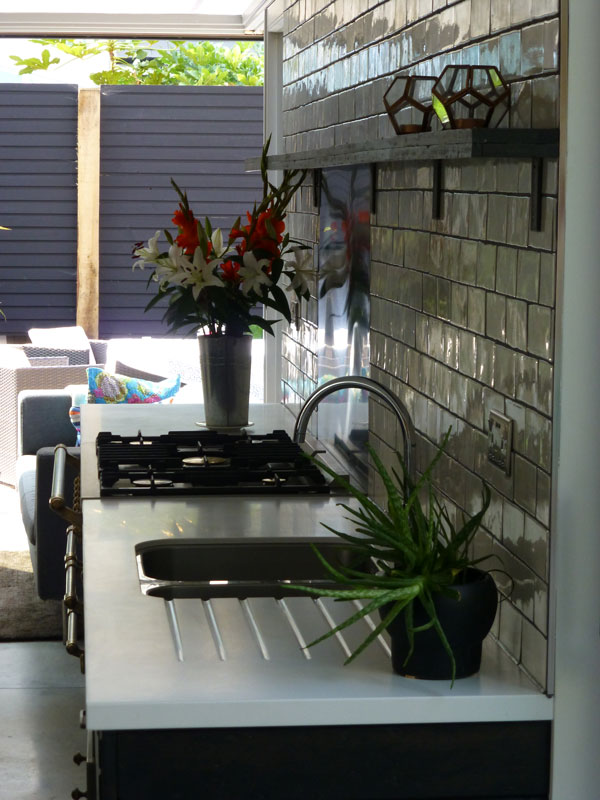 Corian worktop in Light Ash on rustic plank kitchen cabinets