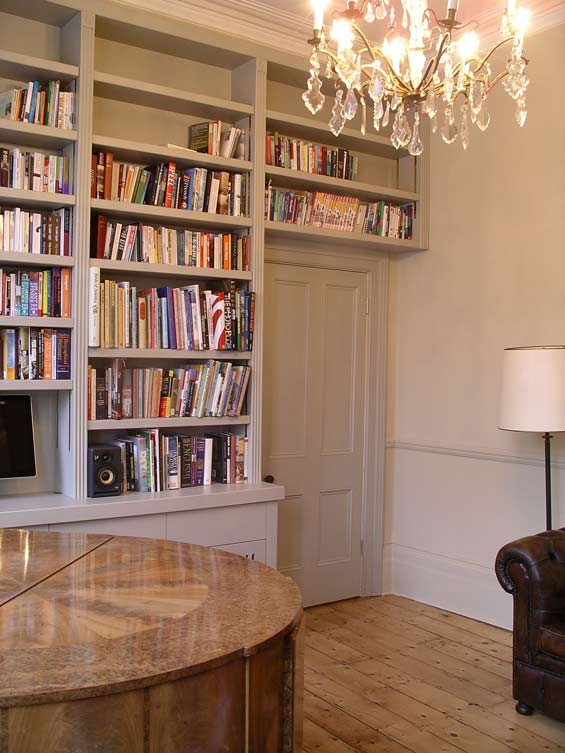 bespoke fitted hand painted bookcase with cupboards