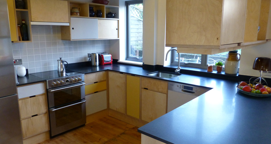 black granite worktops on birch ply kitchen