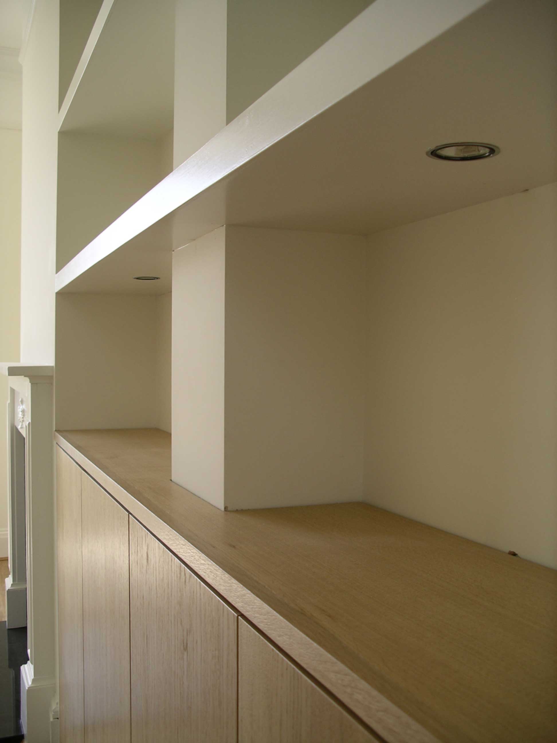 pressure catch doors with recessed downlights in the chunky shelves