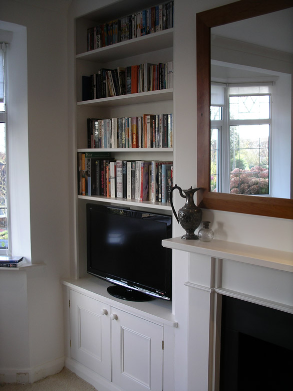 purpose built period style alcove cupboard and bookcase