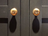 antique brass
              knobs on custom made wardrobe