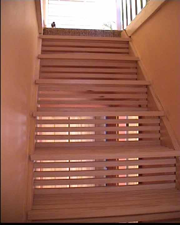 slatted staircase handmade in yellow pine
